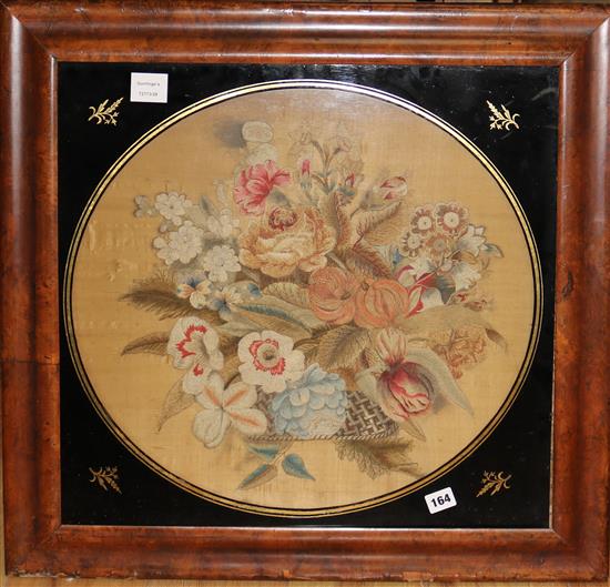 A large needlework floral panel